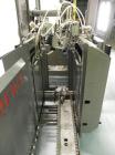 Used Marq Model HPE-RH NS Case Erector Bottom Sealer. Capable of speeds from 30 to 40 cases per minute. Is set up to tape boxes closed (with a side seal). Has a formed case size range: Length 10