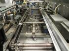 Used Marq Model HPE-RH NS Case Erector Bottom Sealer. Capable of speeds from 30 to 40 cases per minute. Is set up to tape boxes closed (with a side seal). Has a formed case size range: Length 10