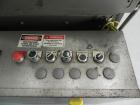 Used Marq Model HPE-RH NS Case Erector Bottom Sealer. Capable of speeds from 30 to 40 cases per minute. Is set up to tape boxes closed (with a side seal). Has a formed case size range: Length 10