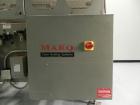 Used Marq Model HPE-RH NS Case Erector Bottom Sealer. Capable of speeds from 30 to 40 cases per minute. Is set up to tape boxes closed (with a side seal). Has a formed case size range: Length 10