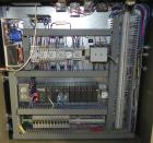 Used Marq Model HPE-RH NS Case Erector Bottom Sealer. Capable of speeds from 30 to 40 cases per minute. Is set up to tape boxes closed (with a side seal). Has a formed case size range: Length 10