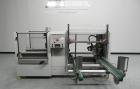 Used OK International Model Duraformer 2 Automatic Case Erector and Bottom Taper. Machine is capable of speeds up to 18 cases per minute. Case size range: (Length) 7