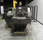 Used Hartness (SWF/McDowell) Model 201LH Automatic Case Erector Bottom Sealer. Capable of speeds up to 30 cases per minute. Has a case size range: (Length) 5-3/4