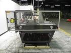 Used Hartness (SWF/McDowell) Model 201LH Automatic Case Erector Bottom Sealer. Capable of speeds up to 30 cases per minute. Has a case size range: (Length) 5-3/4