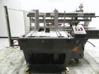 Used Hartness (SWF/McDowell) Model 201LH Automatic Case Erector Bottom Sealer. Capable of speeds up to 30 cases per minute. Has a case size range: (Length) 5-3/4