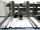 Used Hartness (SWF/McDowell) Model 201LH Automatic Case Erector Bottom Sealer. Capable of speeds up to 30 cases per minute. Has a case size range: (Length) 5-3/4