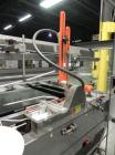 Used Hartness (SWF/McDowell) Model 201LH Automatic Case Erector Bottom Sealer. Capable of speeds up to 30 cases per minute. Has a case size range: (Length) 5-3/4