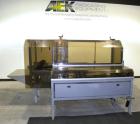 Used Soco Case Erector, Model BE-300-ABS2. Capable of speeds up to 8 cpm. Has bottom tape sealer. Case size range: length 300 to 620 mm, width 200 to 400 mm, depth 130 to 500 mm. Includes an Allen Br...