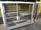 Used Soco Case Erector, Model BE-300-ABS2. Capable of speeds up to 8 cpm. Has bottom tape sealer. Case size range: length 300 to 620 mm, width 200 to 400 mm, depth 130 to 500 mm. Includes an Allen Br...
