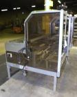 Used Soco Case Erector, Model BE-300-ABS2. Capable of speeds up to 8 cpm. Has bottom tape sealer. Case size range: length 300 to 620 mm, width 200 to 400 mm, depth 130 to 500 mm. Includes an Allen Br...