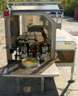 Used Soco Case Erector, Model BE-300-ABS2. Capable of speeds up to 8 cpm. Has bottom tape sealer. Case size range: length 300 to 620 mm, width 200 to 400 mm, depth 130 to 500 mm. Includes an Allen Br...