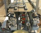 Used Soco Case Erector, Model BE-300-ABS2. Capable of speeds up to 8 cpm. Has bottom tape sealer. Case size range: length 300 to 620 mm, width 200 to 400 mm, depth 130 to 500 mm. Includes an Allen Br...