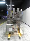 Used Wepackit Model MPE300 Case Erector Bottom Tape Sealer. Machine is capable of speeds up to 20 cases per minute. Knockdown case size range: 16