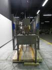 Used Wepackit Model MPE300 Case Erector Bottom Tape Sealer. Machine is capable of speeds up to 20 cases per minute. Knockdown case size range: 16