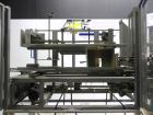Used Wepackit Model MPE300 Case Erector Bottom Tape Sealer. Machine is capable of speeds up to 20 cases per minute. Knockdown case size range: 16