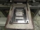 Used Wepackit Model MPE300 Case Erector Bottom Tape Sealer. Machine is capable of speeds up to 20 cases per minute. Knockdown case size range: 16