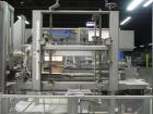 Used Wepackit Model MPE300 Case Erector Bottom Tape Sealer. Machine is capable of speeds up to 20 cases per minute. Knockdown case size range: 16