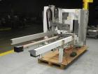 Used Wexxar Silver Series Model 615T Automatic Case Erector and Bottom Sealer. Capable of speeds up to 25 cases per minute. Has pin and dome technology. Case Size range Blank Width: 16