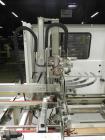 Used Wexxar Silver Series Model 615T Automatic Case Erector and Bottom Sealer. Capable of speeds up to 25 cases per minute. Has pin and dome technology. Case Size range Blank Width: 16