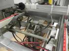 Used Wexxar Silver Series Model 615T Automatic Case Erector and Bottom Sealer. Capable of speeds up to 25 cases per minute. Has pin and dome technology. Case Size range Blank Width: 16
