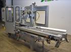 Used Wexxar Model ABF-T Automatic Case Erector and Bottom Tape Sealer.