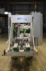 Used Wexxar Model ABF-T Automatic Case Erector and Bottom Tape Sealer.