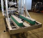 Used Wexxar Model ABF-T Automatic Case Erector and Bottom Tape Sealer.