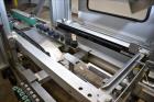 Used Wexxar Model ABF-T Automatic Case Erector and Bottom Tape Sealer.