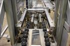 Used Wexxar Model ABF-T Automatic Case Erector and Bottom Tape Sealer.