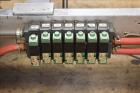 Used Wexxar Model ABF-T Automatic Case Erector and Bottom Tape Sealer.
