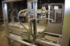 Used Wexxar Model ABF-T Automatic Case Erector and Bottom Tape Sealer.