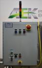 Used Wexxar Model ABF-T Automatic Case Erector and Bottom Tape Sealer.