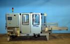 Used Wexxar Model WF-2TR Automatic Case Erector and Bottom Taper.  Case former is capable of speeds up to 30 cases per minute.  Case size range: Length 7