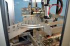 Used Wexxar Model WF-2TR Automatic Case Erector and Bottom Taper.  Case former is capable of speeds up to 30 cases per minute.  Case size range: Length 7