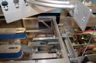 Used Wexxar Model WF-2TR Automatic Case Erector and Bottom Taper.  Case former is capable of speeds up to 30 cases per minute.  Case size range: Length 7