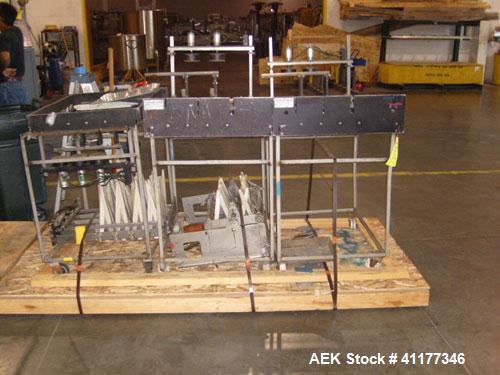 Used Hartness International 825SS drop case packer. Capable of speeds up to 25 CPM. Case size range: length 7" to 22.5", width 5.5" to 16.5", height 2"  to 20".  All stainless steel construction. Has...
