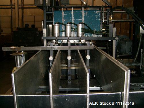 Used Hartness International 825SS drop case packer. Capable of speeds up to 25 CPM. Case size range: length 7" to 22.5", width 5.5" to 16.5", height 2"  to 20".  All stainless steel construction. Has...