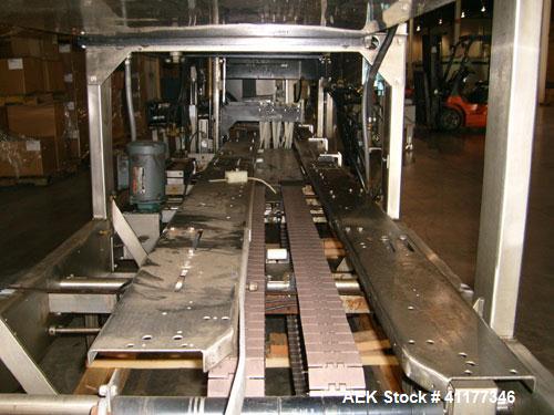 Used Hartness International 825SS drop case packer. Capable of speeds up to 25 CPM. Case size range: length 7" to 22.5", width 5.5" to 16.5", height 2"  to 20".  All stainless steel construction. Has...
