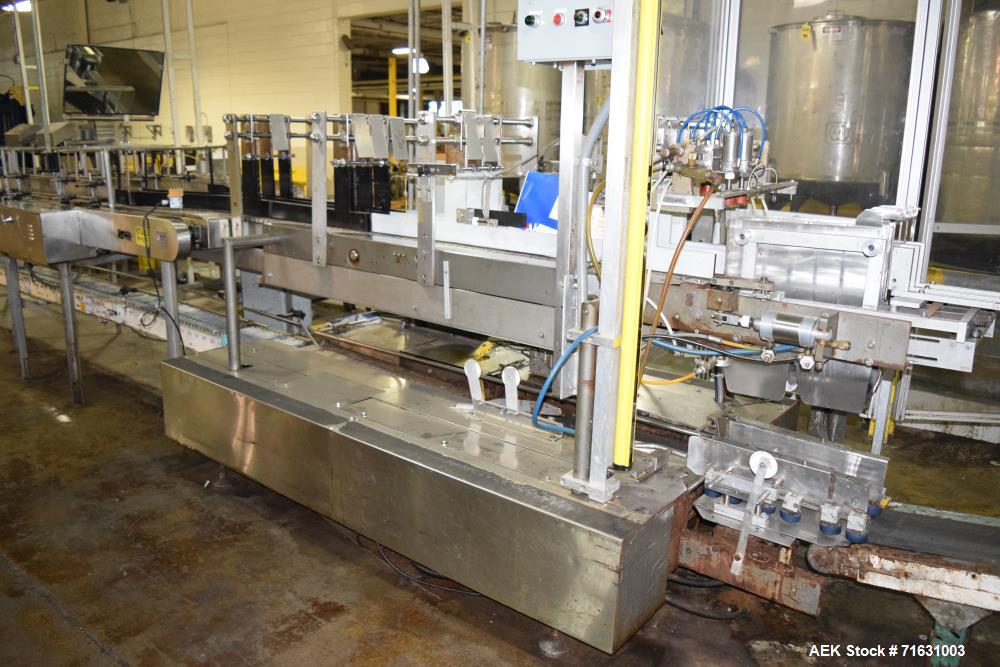 Used Akron Spartan Drop Case Packer, S/N 5P 7078 with Nercon 2-Lane Combining Conveyor, Drives, *Incomplete controls*.
