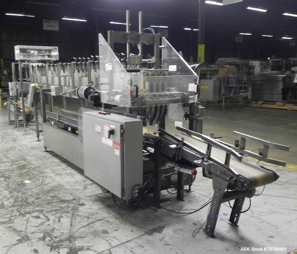 Used Combi Packaging Systems Model DPI Drop Case Packer. Has a model 2LD128 laner option. Capable of speeds up to 28 cases per minute. Has a case size range: (length) 4.5" - 24" (width) 4.5" - 16" (h...