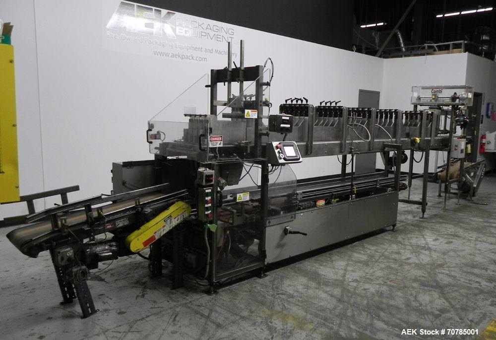 Used Combi Packaging Systems Model DPI Drop Case Packer. Has a model 2LD128 laner option. Capable of speeds up to 28 cases per minute. Has a case size range: (length) 4.5" - 24" (width) 4.5" - 16" (h...