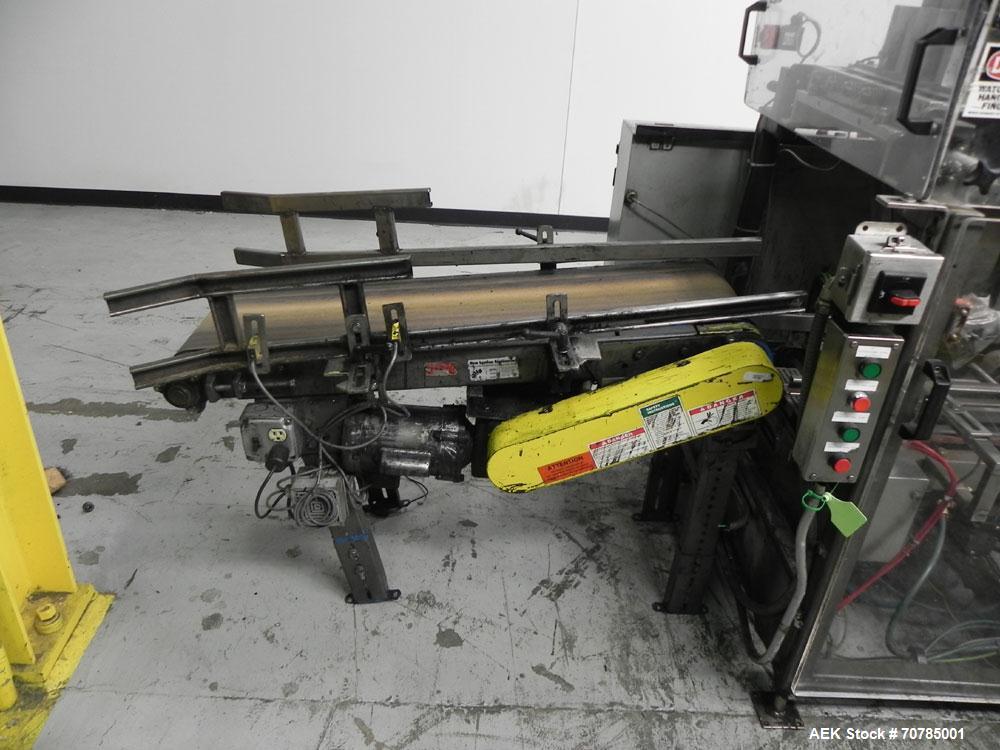 Used Combi Packaging Systems Model DPI Drop Case Packer. Has a model 2LD128 laner option. Capable of speeds up to 28 cases per minute. Has a case size range: (length) 4.5" - 24" (width) 4.5" - 16" (h...