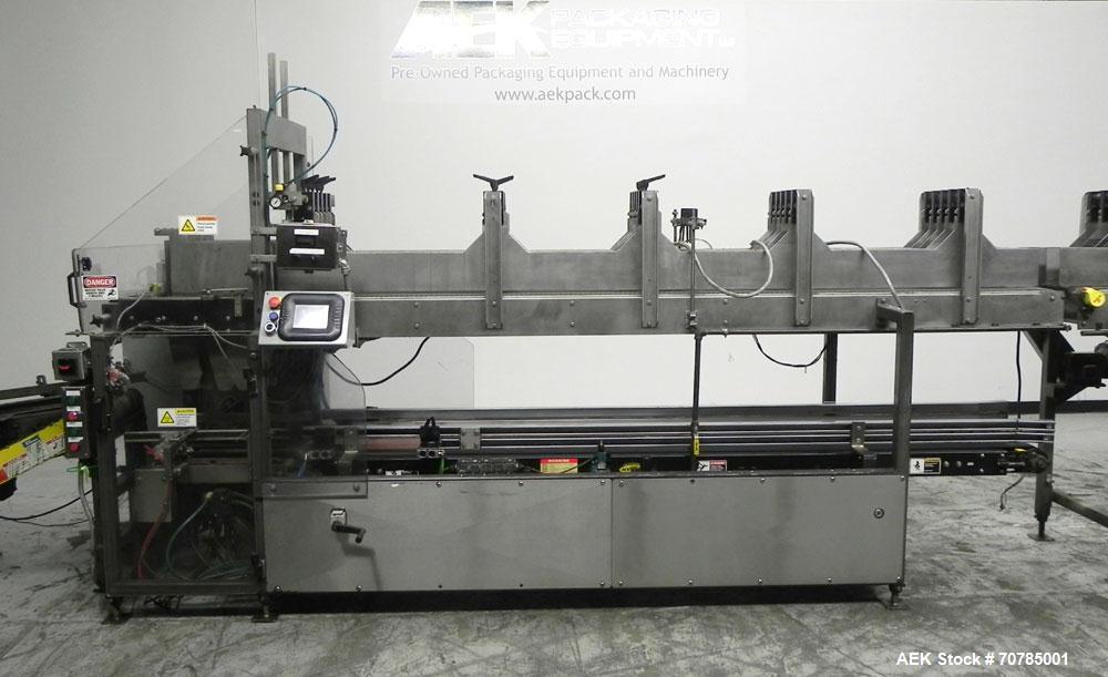 Used Combi Packaging Systems Model DPI Drop Case Packer. Has a model 2LD128 laner option. Capable of speeds up to 28 cases per minute. Has a case size range: (length) 4.5" - 24" (width) 4.5" - 16" (h...