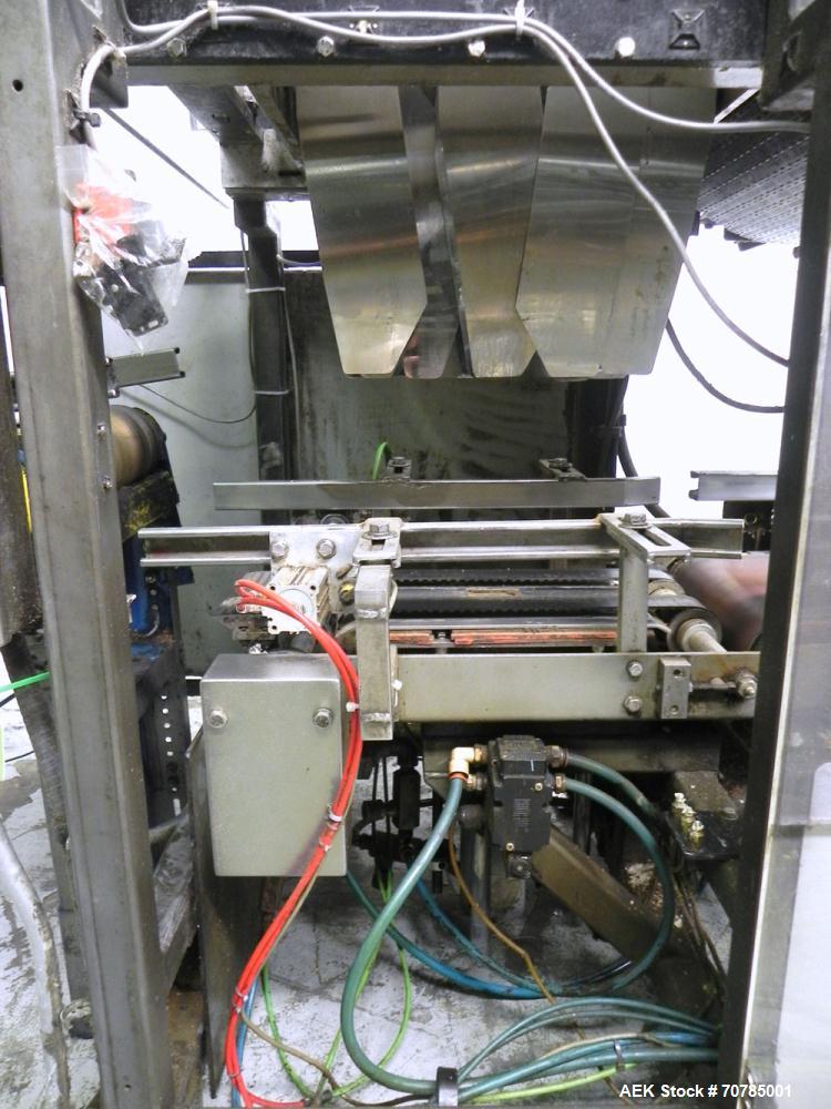 Used Combi Packaging Systems Model DPI Drop Case Packer. Has a model 2LD128 laner option. Capable of speeds up to 28 cases per minute. Has a case size range: (length) 4.5" - 24" (width) 4.5" - 16" (h...