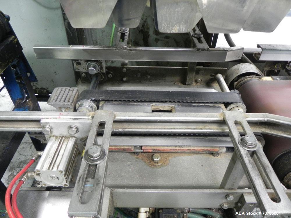 Used Combi Packaging Systems Model DPI Drop Case Packer. Has a model 2LD128 laner option. Capable of speeds up to 28 cases per minute. Has a case size range: (length) 4.5" - 24" (width) 4.5" - 16" (h...