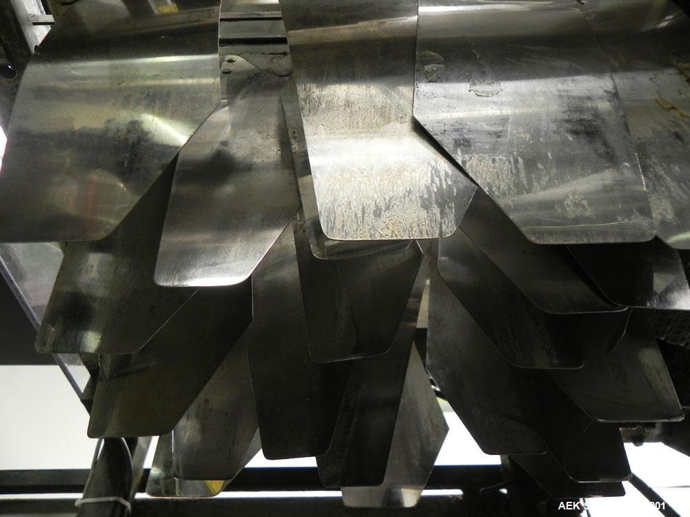 Used Combi Packaging Systems Model DPI Drop Case Packer. Has a model 2LD128 laner option. Capable of speeds up to 28 cases per minute. Has a case size range: (length) 4.5" - 24" (width) 4.5" - 16" (h...
