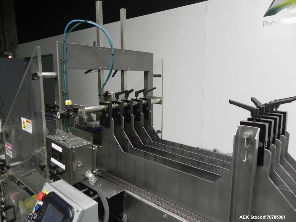 Used Combi Packaging Systems Model DPI Drop Case Packer. Has a model 2LD128 laner option. Capable of speeds up to 28 cases per minute. Has a case size range: (length) 4.5" - 24" (width) 4.5" - 16" (h...