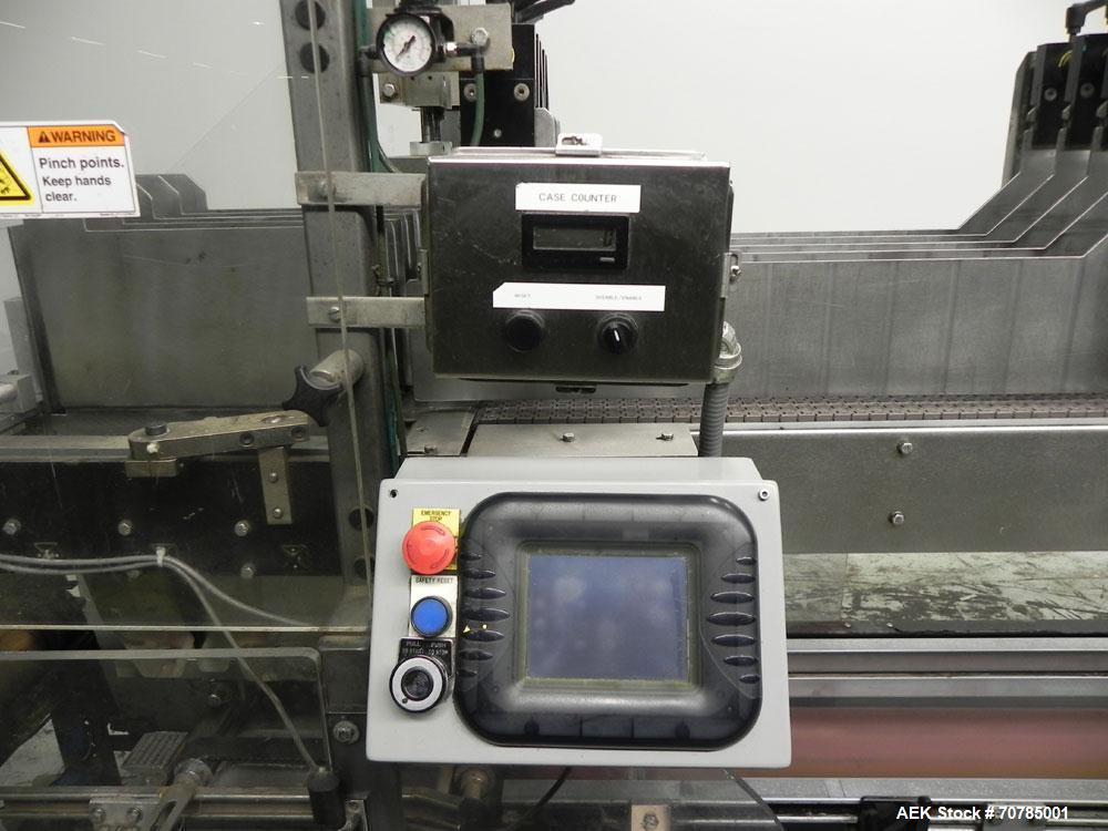 Used Combi Packaging Systems Model DPI Drop Case Packer. Has a model 2LD128 laner option. Capable of speeds up to 28 cases per minute. Has a case size range: (length) 4.5" - 24" (width) 4.5" - 16" (h...
