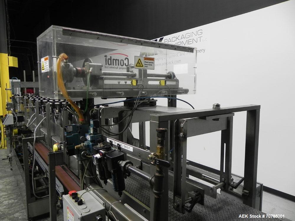 Used Combi Packaging Systems Model DPI Drop Case Packer. Has a model 2LD128 laner option. Capable of speeds up to 28 cases per minute. Has a case size range: (length) 4.5" - 24" (width) 4.5" - 16" (h...
