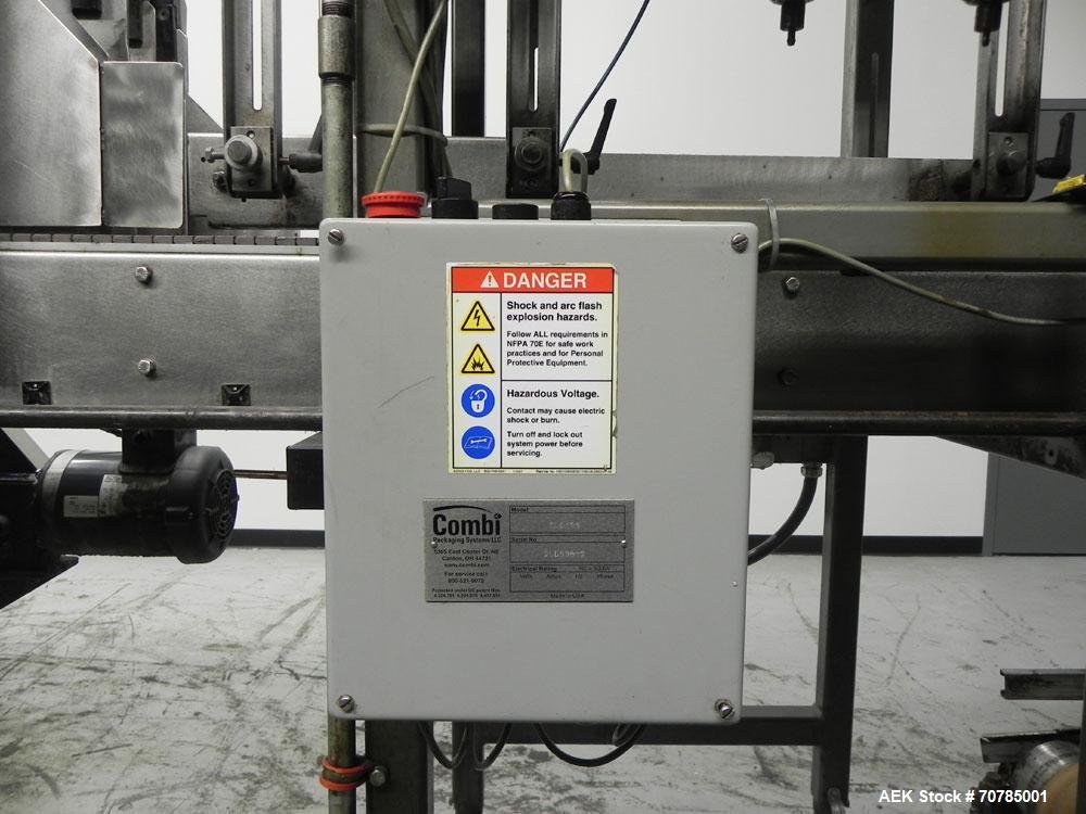 Used Combi Packaging Systems Model DPI Drop Case Packer. Has a model 2LD128 laner option. Capable of speeds up to 28 cases per minute. Has a case size range: (length) 4.5" - 24" (width) 4.5" - 16" (h...